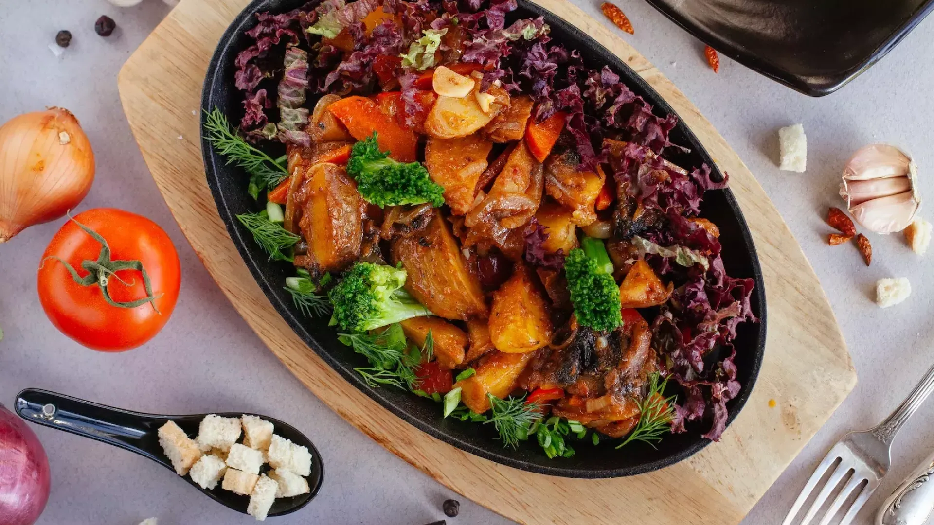 A table full of delicious vegetarian and vegan dishes.